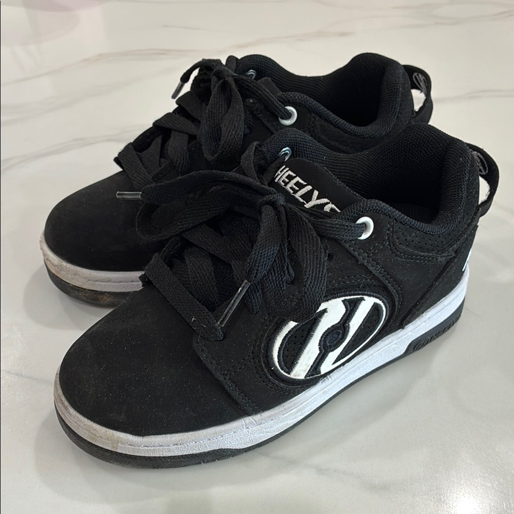 Heelys Black Sneakers with White Accents and Chunky Silhouette